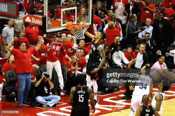 Gerald Green of the Houston Rockets dunks in the first half against the Golden State Warriors of Game Two of the Western Conference Finals of the...