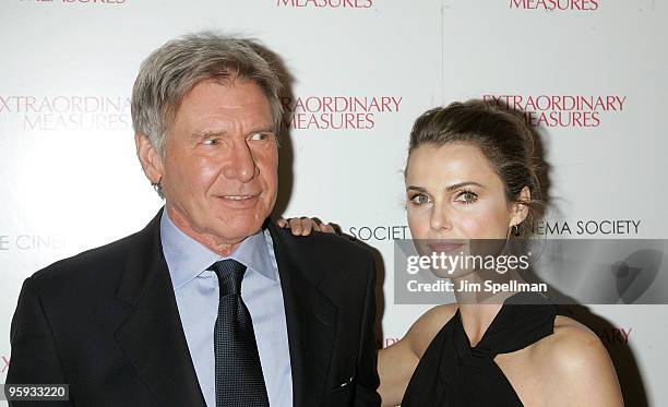 Actors Harrison Ford and Keri Russell attend the Cinema Society with John & Aileen Crowley screening of "Extraordinary Measures" at the School of...