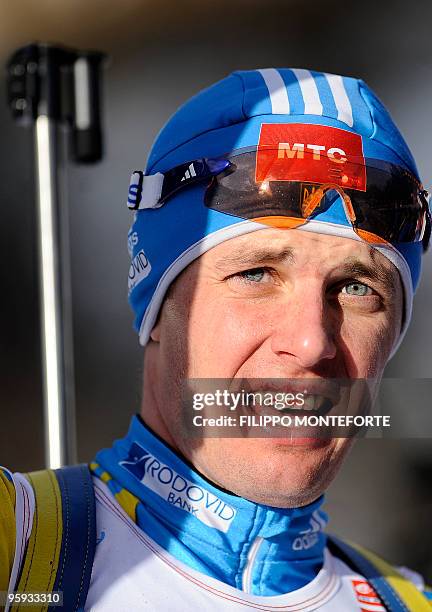 Ukranian Serguei Sednev celebrates his first place at the finish of the men's 20 km individual event of the Biathlon World Cup in Anterselva on...