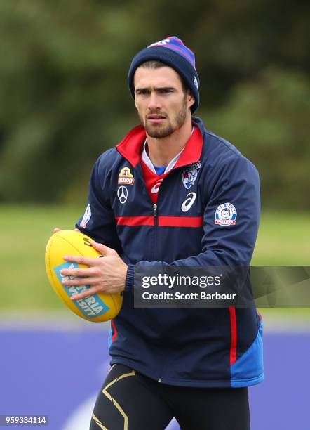 Easton Wood of the Bulldogs runs with the ball during a Western Bulldogs AFL training session at Whitten Oval on May 17, 2018 in Melbourne, Australia.