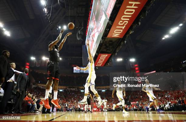 James Harden of the Houston Rockets shoots against Stephen Curry of the Golden State Warriors in the first half of Game Two of the Western Conference...