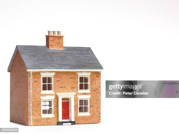 house on white background with copy space - hausmodell stock-fotos und bilder