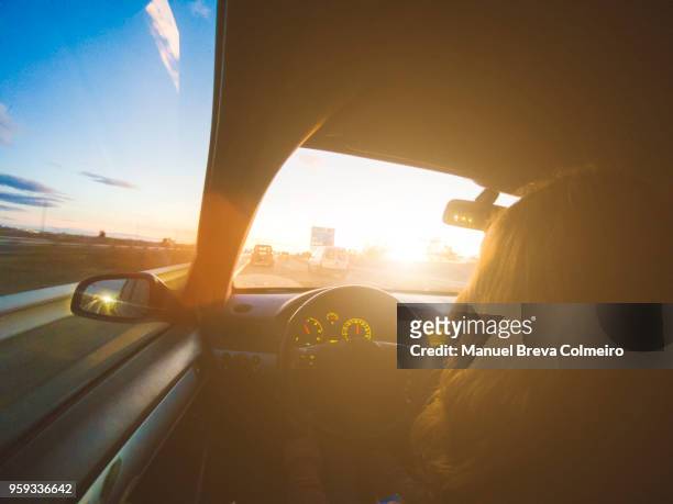 woman driving her car - green car crash imagens e fotografias de stock