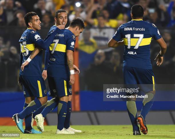 Carlos Tevez of Boca Juniors celebrates with teammates after scoring the fifth goal of his team during a match between Boca Juniors and Alianza Lima...
