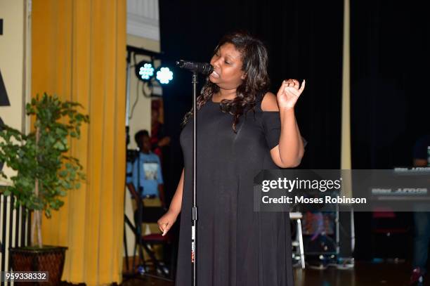 Carver High School student Tamia Porter performs at the GRAMMY Signature Schools Enterprise Award presentation at George W. Carver High School on May...