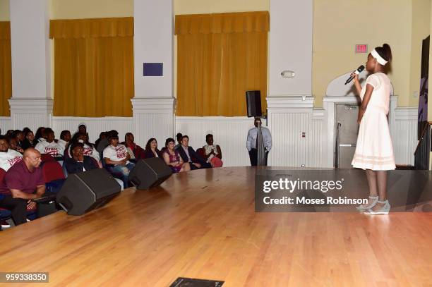 Carver High School student Lisa Nalls performs at the GRAMMY Signature Schools Enterprise Award presentation at George W. Carver High School on May...