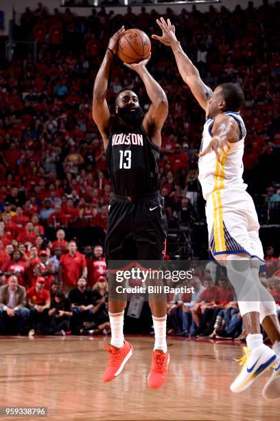 James Harden of the Houston Rockets shoots the ball against the Golden State Warriors in Game Two of the Western Conference Finals of the 2018 NBA...