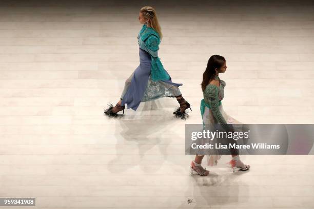 Models walk the runway during the Still Still Studio show at Mercedes-Benz Fashion Week Resort 19 Collections at Carriageworks on May 17, 2018 in...