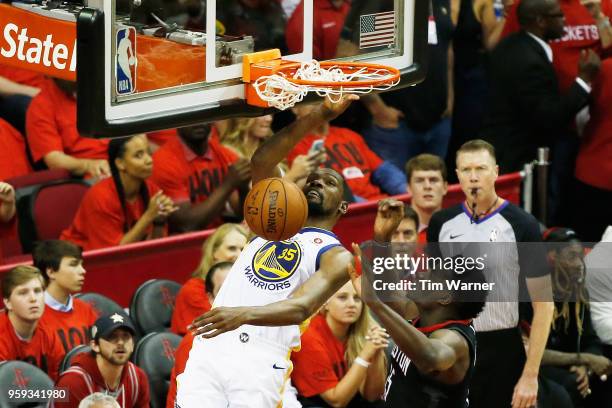 Kevin Durant of the Golden State Warriors dunks against Clint Capela of the Houston Rockets in the second half of Game Two of the Western Conference...