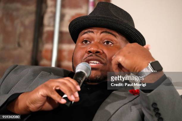 Tenor Issachah Savage speaks during a panel discussion at the Vocal Health Clinic event hosted by The Recording Academy WDC Chapter and MusiCares at...