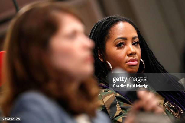 Singer Lalah Hathaway listens to Dr. Nazaneen Grant speak during a panel discussion at the Vocal Health Clinic event hosted by The Recording Academy...