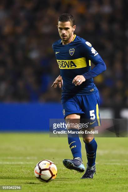 Fernando Gago of Boca Juniors kicks the ball during a match between Boca Juniors and Alianza Lima at Alberto J. Armando Stadium on May 16, 2018 in La...