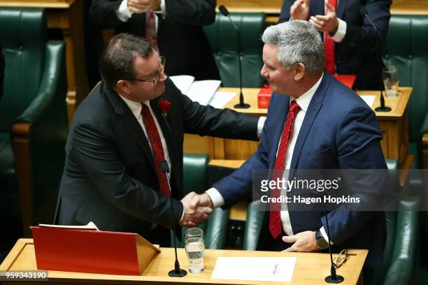 Finance Minister Grant Robertson shakes hands with Kelvin Davis after his 2018 budget presentation at Parliament on May 17, 2018 in Wellington, New...