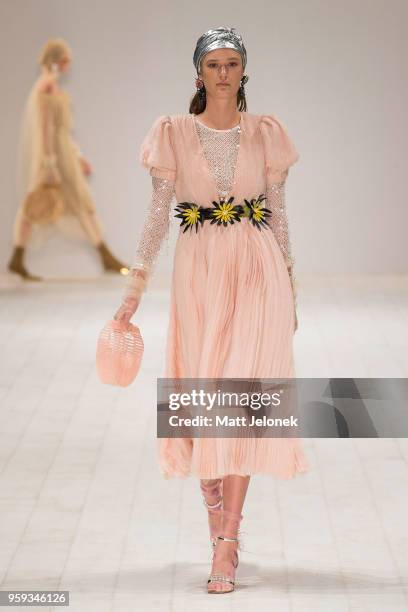 Model walks the runway during the Still Still Studio show at Mercedes-Benz Fashion Week Resort 19 Collections at Carriageworks on May 17, 2018 in...