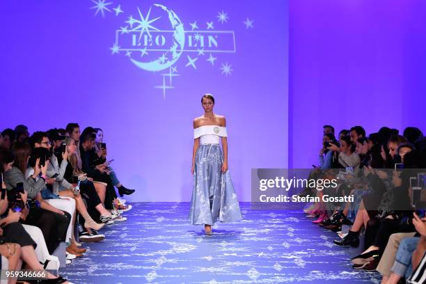 Model walks the runway during the Leo & Lin show at Mercedes-Benz Fashion Week Resort 19 Collections at Carriageworks on May 17, 2018 in Sydney,...