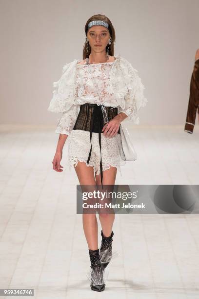 Model walks the runway during the Still Still Studio show at Mercedes-Benz Fashion Week Resort 19 Collections at Carriageworks on May 17, 2018 in...