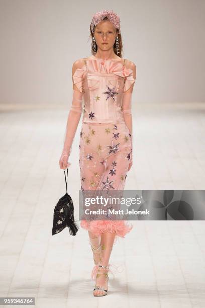 Model walks the runway during the Still Still Studio show at Mercedes-Benz Fashion Week Resort 19 Collections at Carriageworks on May 17, 2018 in...