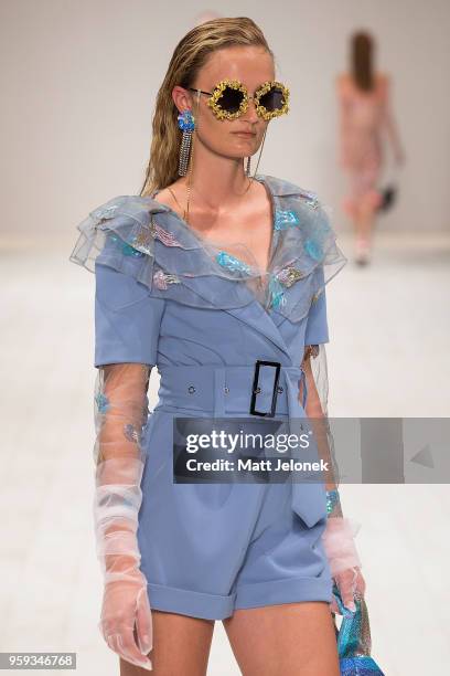 Model walks the runway during the Still Still Studio show at Mercedes-Benz Fashion Week Resort 19 Collections at Carriageworks on May 17, 2018 in...