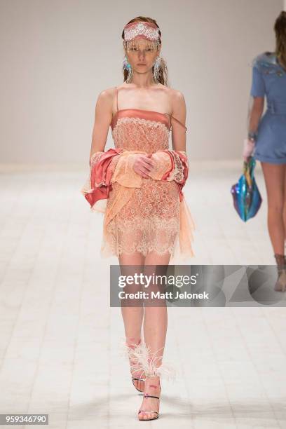 Model walks the runway during the Still Still Studio show at Mercedes-Benz Fashion Week Resort 19 Collections at Carriageworks on May 17, 2018 in...