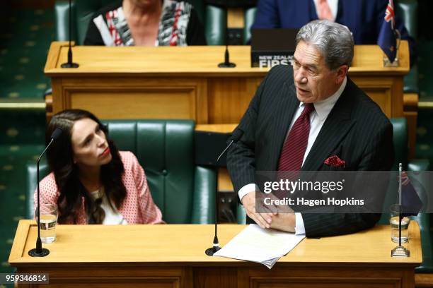 Deputy Prime Minister Winston Peters speaks while Prime Minister Jacinda Ardern looks on during the 2018 budget presentation at Parliament on May 17,...