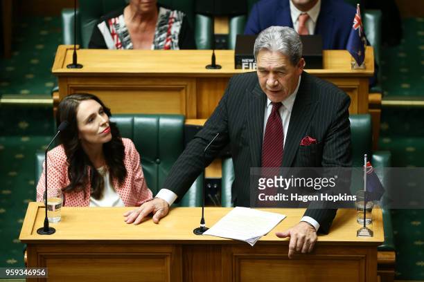 Deputy Prime Minister Winston Peters speaks as Prime Minister Jacinda Ardern looks on during the 2018 budget presentation at Parliament on May 17,...