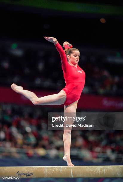 Elise Ray of the United States competes on the balance beam during the Women's Gymnastics event of the Olympic Games on September 15, 2000 in Sydney,...