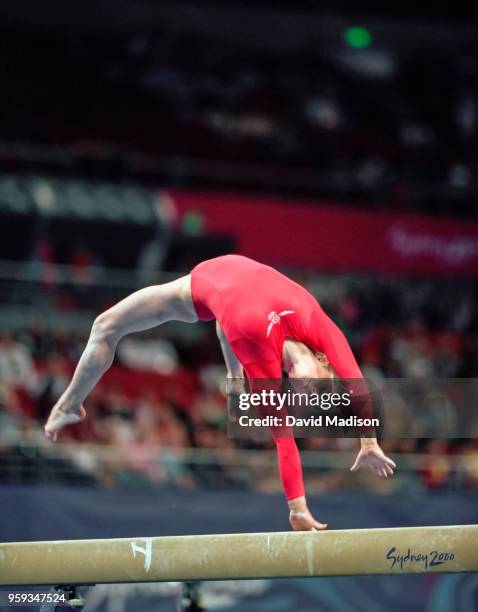 Elise Ray of the United States competes on the balance beam during the Women's Gymnastics event of the Olympic Games on September 15, 2000 in Sydney,...