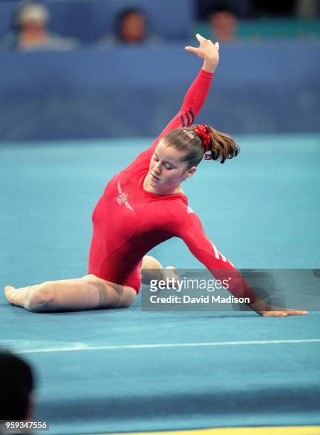 Elise Ray of the United States competes in floor exercise during the Women's Gymnastics event of the Olympic Games on September 15, 2000 in Sydney,...