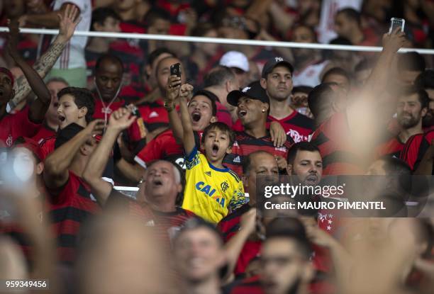 Brazil's Flamengo supporters celebrate the victory against Ecuador's Emelec team during the Copa Libertadores 2018 football match between Brazil's...