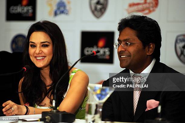 Indian Premier League Commissioner Lalit Kumar Modi and Bollywood actress and 'Kings XI Punjab' cricket team co-owner Priety Zinta attend a press...