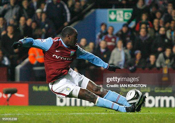 Aston Villa's Emile Heskey scores his goal against Blackburn Rovers during the league cup semi final second leg football match at Villa Park in...