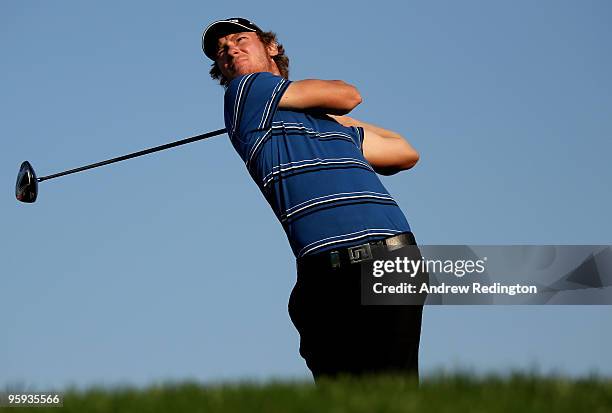 Chris Wood of England hits his tee-shot on the 16th hole during the second round of The Abu Dhabi Golf Championship at Abu Dhabi Golf Club on January...