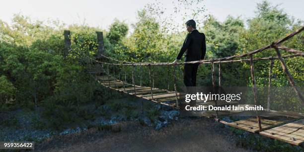 Crash Rope Bridge 34 Broken Rope Bridge Stock Photos, High-Res Pictures, and Images ...