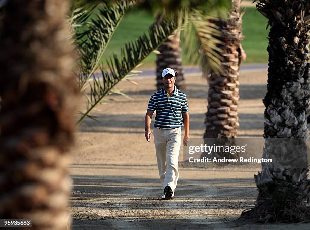 Steve Webster of England walks towards his ball on the eighth hole during the second round of The Abu Dhabi Golf Championship at Abu Dhabi Golf Club...