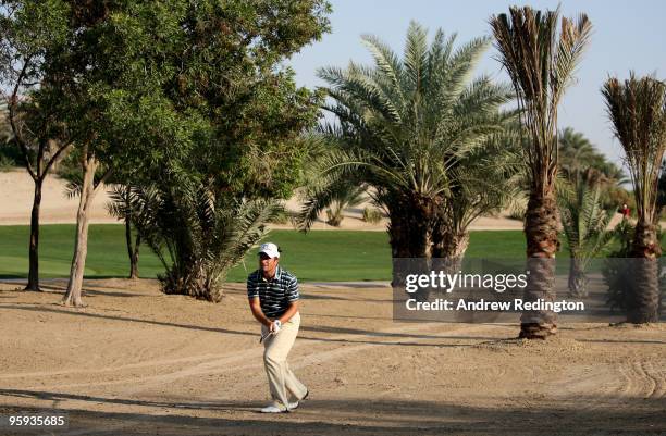 Steve Webster of England plays his second shot on the eighth hole during the second round of The Abu Dhabi Golf Championship at Abu Dhabi Golf Club...