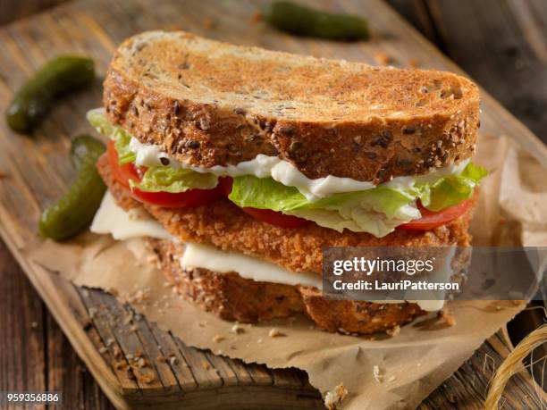 breaded pork cutlet sandwich - schnitzel stock pictures, royalty-free photos & images