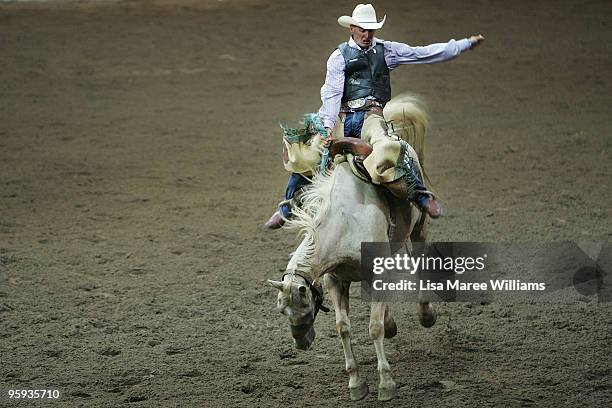 Saddle Bronc rider Mark Palmer competes during the ABCRA National Rodeo Finals on January 22, 2010 in Tamworth, Australia. The National Rodeo is held...