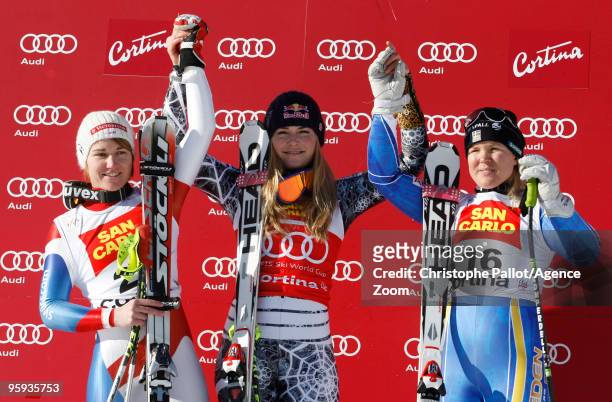 Lindsey Vonn of the USA takes 1st place, Fabienne Suter of Switzerland takes 2nd place, Anja Paerson of Sweden takes 3rd place during the Audi FIS...