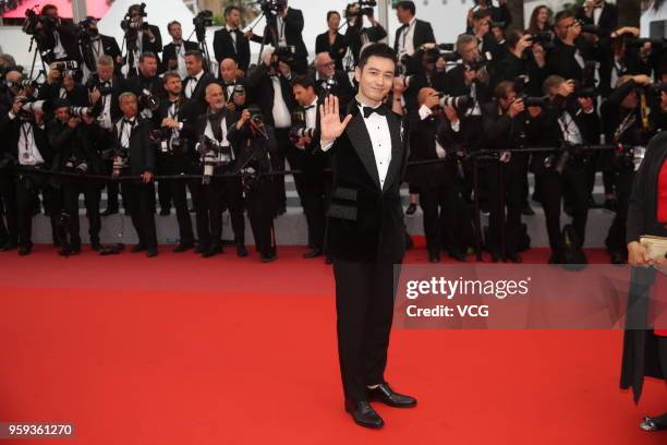 Actor Huang Xiaoming attends the screening of 'Burning' during the 71st annual Cannes Film Festival at Palais des Festivals on May 16, 2018 in...