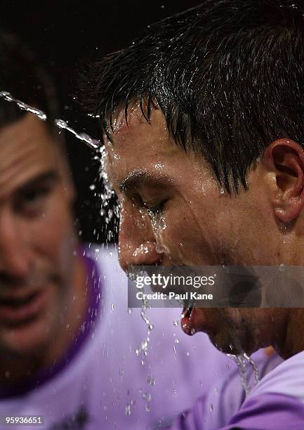 Jacob Burns of the Glory pours water on his face during the round 24 A-League match between the Perth Glory and the Wellington Phoenix at ME Bank...