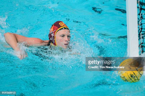 Amanda Longan of the University of Southern California reaches for a loose ball during the Division I Women's Water Polo Championship at the Uytengsu...