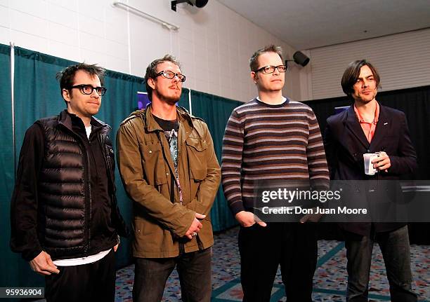 Rivers Cuomo, Scott Shriner, Patrick Wilson and Brain Bell of Weezer pose backstage before their performance at the T-Mobile Motorola CLIQ Challenge...