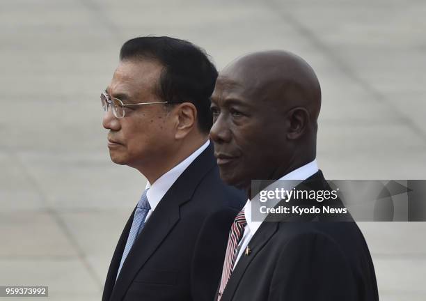 Trinidad and Tobago Prime Minister Keith Rowley attends a welcome ceremony with Chinese Premier Li Keqiang at the Great Hall of the People in Beijing...