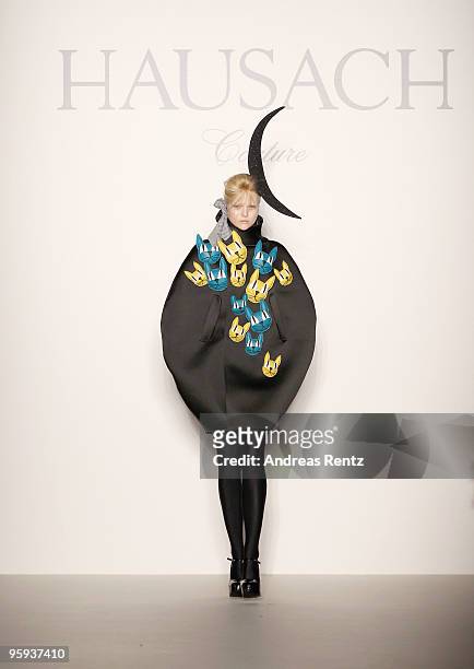 Model walks the runway at the Hausach Couture Fashion Show during the Mercedes-Benz Fashion Week Berlin Autumn/Winter 2010 at the Bebelplatz on...