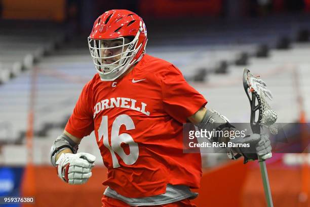 Jack Bolen of the Cornell Big Red controls the ball against the Syracuse Orange during a 2018 NCAA Division I Men's Lacrosse Championship First Round...