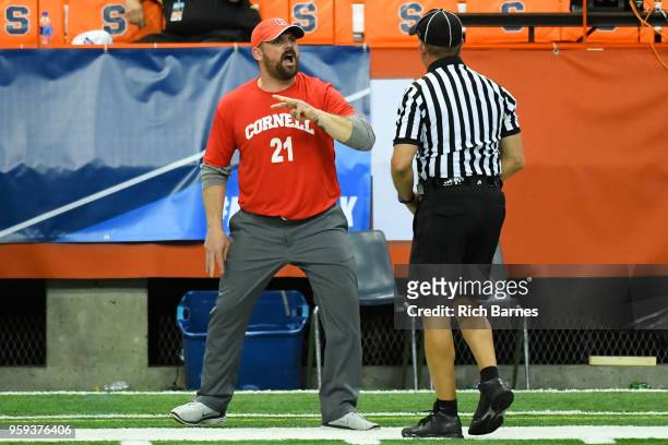 Head coach Peter Milliman of the Cornell Big Red reacts to a call with an official against the Syracuse Orange during a 2018 NCAA Division I Men's...