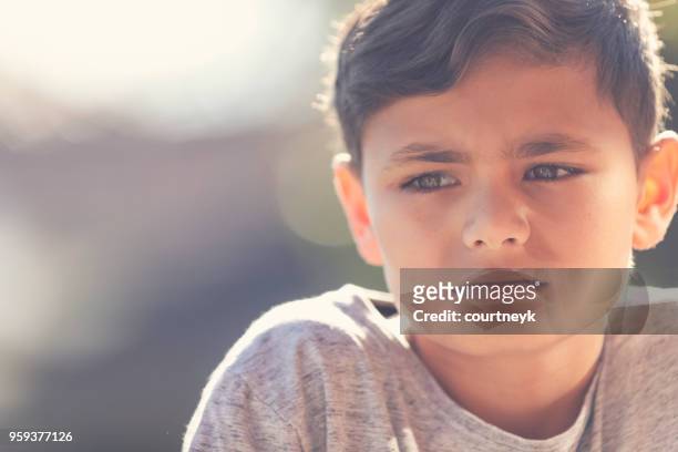 young aboriginal boy portrait. - pre adolescent child stock pictures, royalty-free photos & images