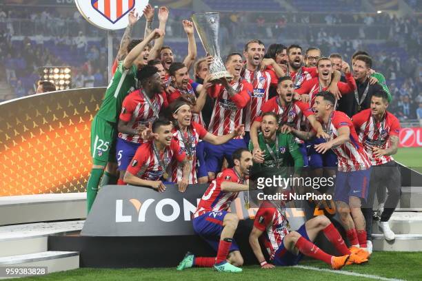 Fernando Torres of Atletico Madrid lifts the UEFA Europa League trophy after the final match between Olympique de Marseille and Club Atletico de...