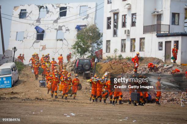 Emergency workers attend the provincial earthquake response drill on May 16, 2018 in Guanghan, Sichuan Province of China. Emergency workers including...