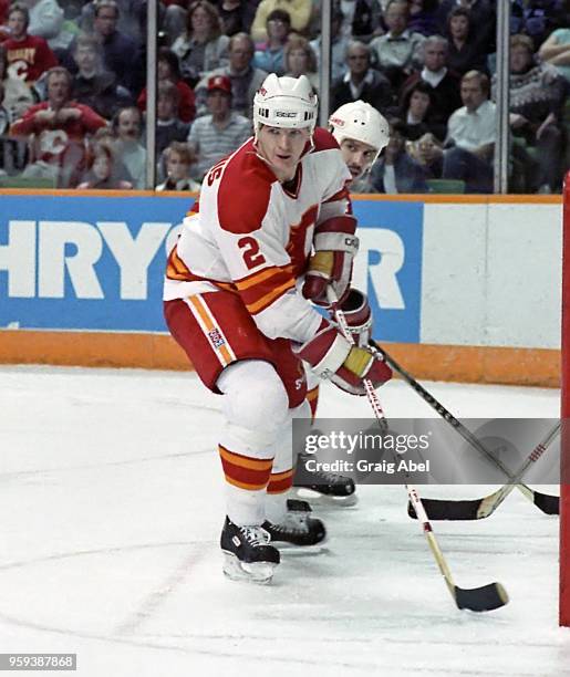 Al MacInnis of the Calgary Flames skates against the Toronto Maple Leafs during NHL game action on February 22, 1989 at Calgary Saddledome in...